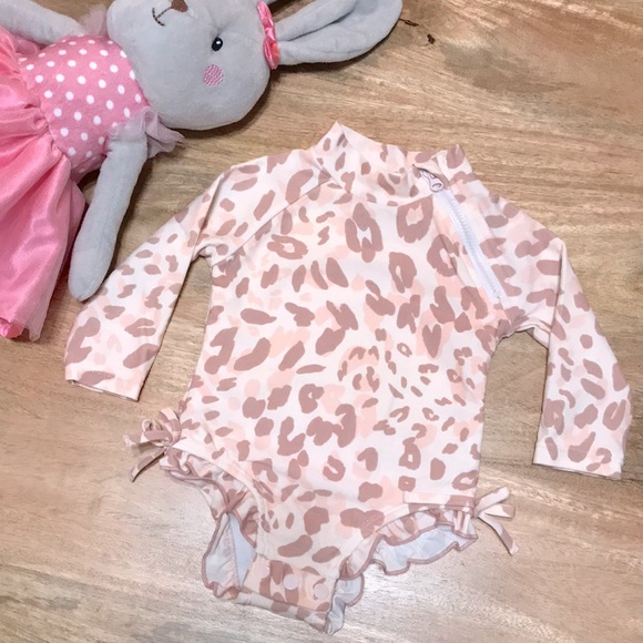 Jessica Simpson Other - Jessica Simpson one piece leopard long sleeve bathing suit